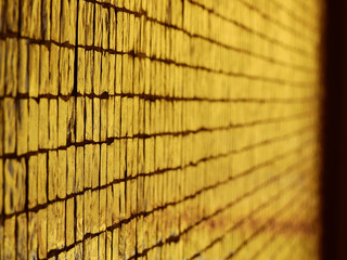 Canvas Print - gold stone tile wall background