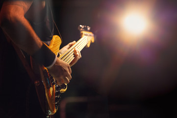 5-string bass player during a live show