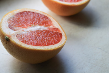 Wall Mural - Grapefruit is cut in half