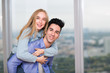 © primipil - Happy young couple. Positive man and woman portrait. Hug and happy.