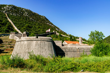 Wall Mural - The great old wall of Ston with a watchtower in the foreground