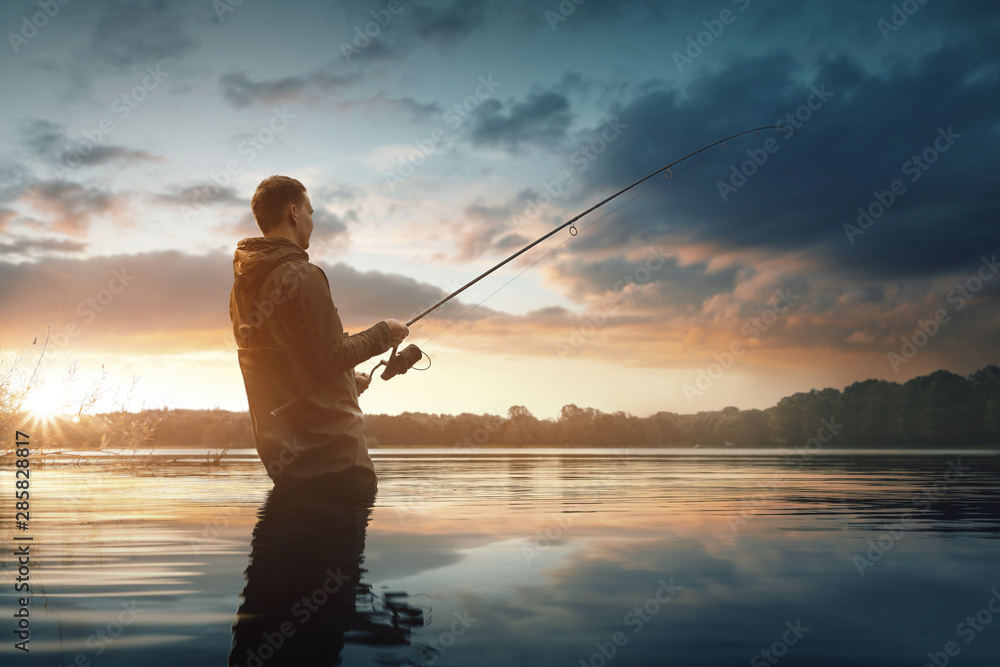 Angler im Wasser - obrazy, fototapety, plakaty 