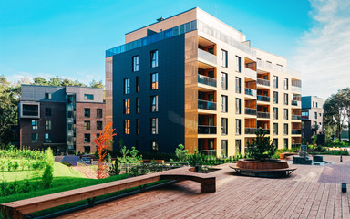 Poster - EU Pine tree at architectural complex of apartment building