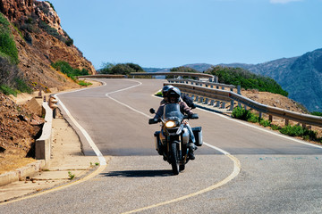 Canvas Print - Motorcycle in road in