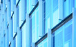Windows of modern futuristic glass and metal skyscraper