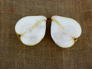 Wall Mural - halves of pears on a linen towel