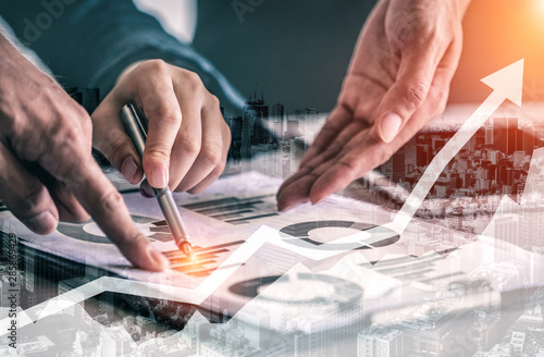 Fotomural Double Exposure Image of Business and Finance - Businessman with report chart up forward to financial profit growth of stock market investment