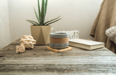 Wall Mural - Home interior with decorative items on a wooden table.