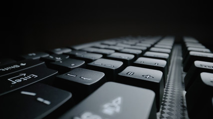 Wall Mural - close-up soft-focus laptop computer keyboard. programming and online marketing business concept.