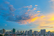The modern skyscrapers and urban skyline of Bangkok during a colorful sunrise, Thailand.