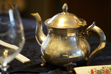 Wall Mural - teapot on wooden table