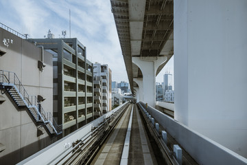 Wall Mural - Cityscape from monorail sky train in Tokyo