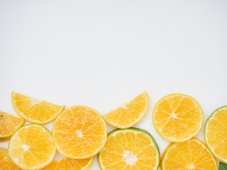 Wall Mural - Sliced ​​oranges on a white background