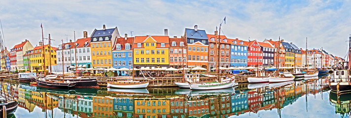 Wall Mural - magical fascinating landscape with boats in a famous nyhavn in the capital of denmark copenhagen. ex