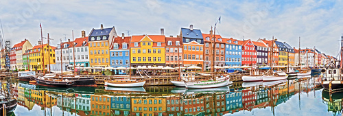 magical fascinating landscape with boats in a famous Nyhavn in the capital of...