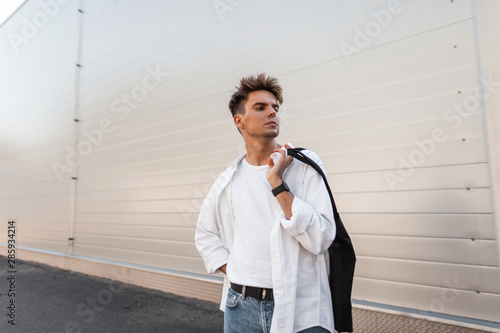 Urban Young Man Fashion Model With Trendy Hairstyle In A Vintage