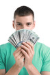 © New Africa - Handsome young man with dollars on white background