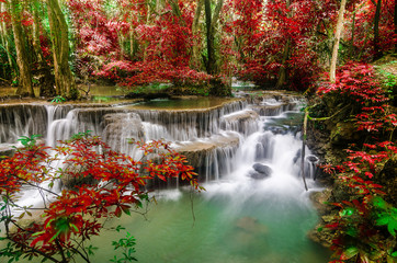   amazing of huay mae kamin waterfall in colorful autumn forest at Kanchanaburi, thailand