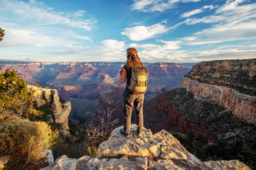 Wall Mural - A hiker in the Grand Canyon National Park, South Rim, Arizona, USA.