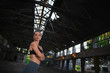 © darezare - Attractive fitness girl posing in abandoned ruined factory