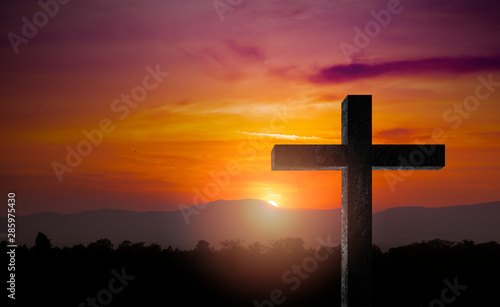 Cuadros en Lienzo Silhouette of crucifix cross time for background