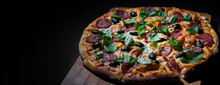 Pepperoni Pizza With Mozzarella Cheese, Salami, Olive, Pepper, Spices And Fresh Basil. Italian Pizza On Dark Grey Black Slate Background