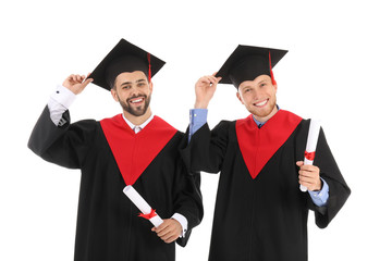 Sticker - Young students in bachelor robes on white background