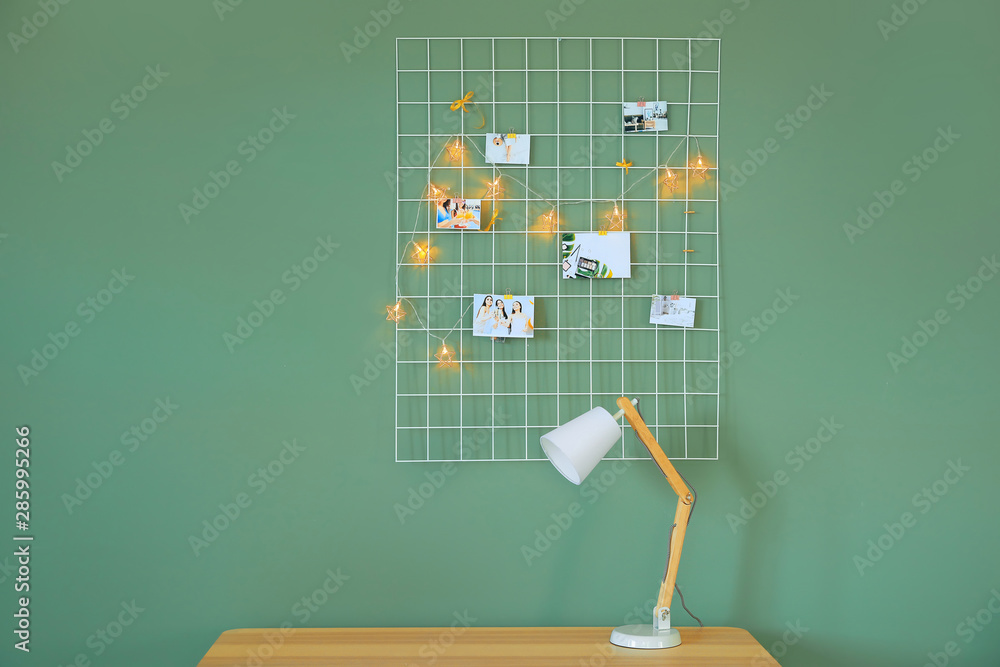 Workplace with mood board near color wall