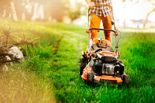 Close Up Details Of Mowing The Lawn With Manual Machinery