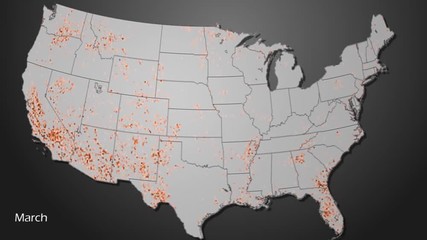 Wall Mural - An animated map visualization shows drought and vegetation health in the United States.