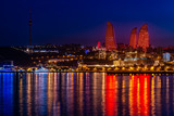 Fototapeta  - Panoramic view of Baku - the capital of Azerbaijan after sunset reflected on the Caspian Sea