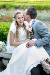 Wall Mural - bride and groom laughing