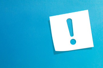 Sticker - Note paper with exclamation mark on blue background 