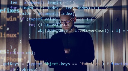 Wall Mural - it engineer is operating a laptop with encrypted code going above him