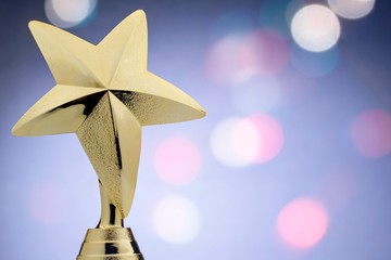 Wall Mural - textured gold star on a trophy award