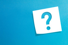 Note Paper With Question Mark On Blue Background 