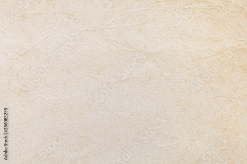 Fotomural Texture of beige old paper, crumpled background