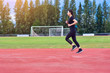 © Suriyo - Runner Women jogging or running in evening at sunlight,Lady run jogging or exercise,Woman Runner or Girl Running