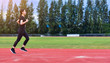 © Suriyo - Runner Women jogging or running in evening at sunlight,Lady run jogging or exercise,Woman Runner or Girl Running