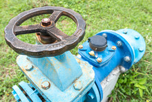 A Pump Station Delivers Water For Agricultural Watering, Water Pumping Station. Valve Faucet And Pumps