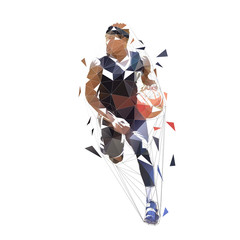 Basketball player running with ball, dribbling. Isolated vector low polygonal illustration, front view. Basketball point guard, geometric style