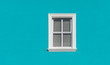Architecture photograph of a design window with turquoise background in the colorful Malay Quarter of Bo Kaap in the city of Cape Town, South Africa.