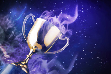 Wall Mural - winner trophy with violet smoke and background abstract star and galaxy.