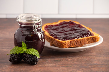 Wall Mural - Jar of Homemade Blackberry Jam on a Rustic Wooden Table