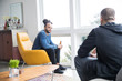 © Mat Hayward - Two men sit and talk