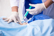 © Elnur - Female patient getting an injection in the clinic