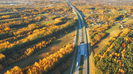 Wall Mural - Drone view of highway in autumn scenery