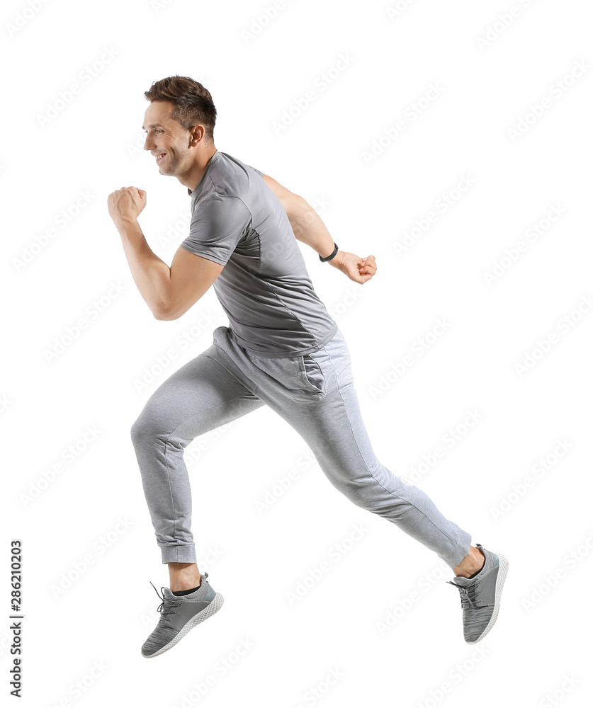 Running young man on white background