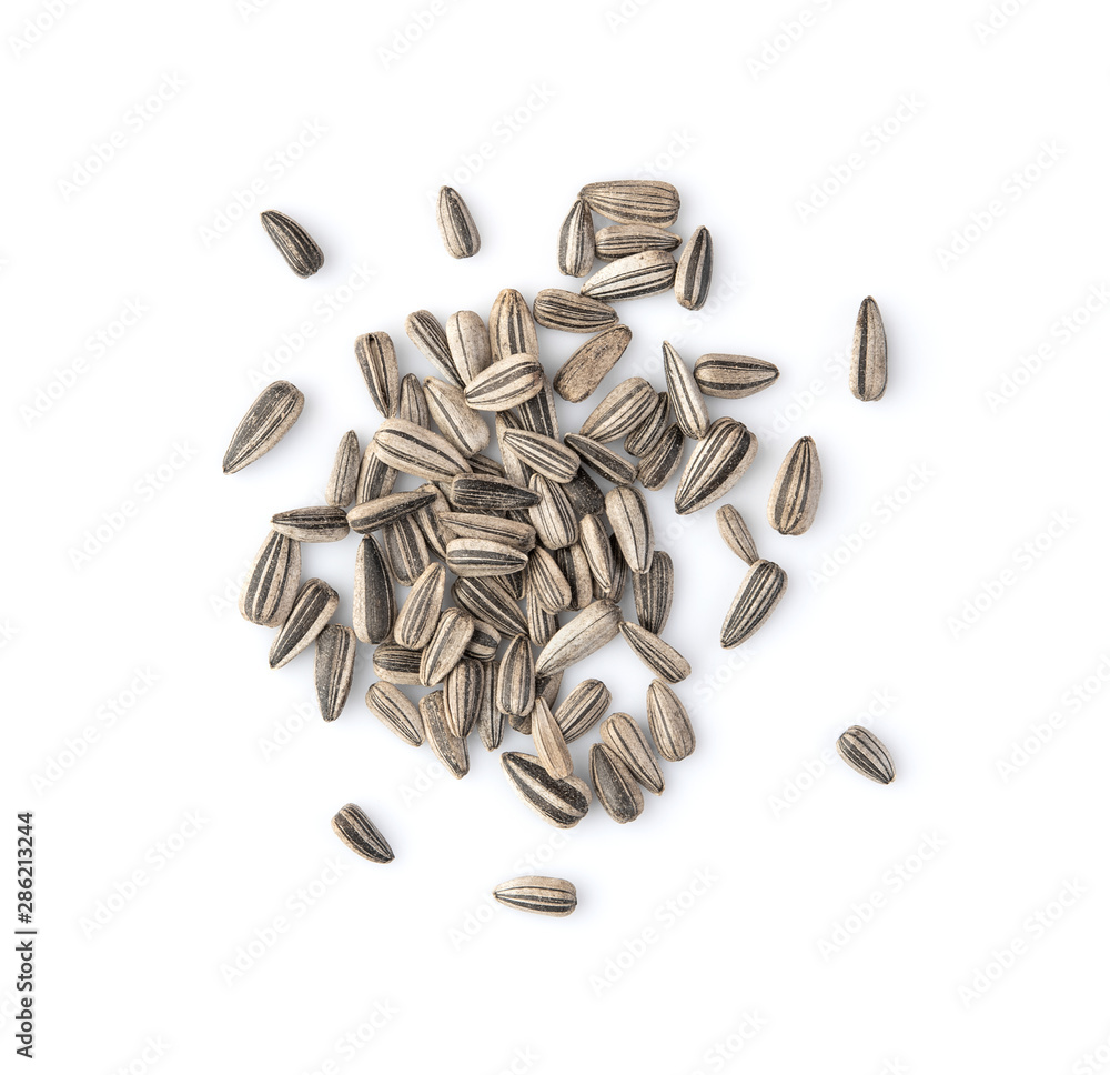 sunflower seeds isolated on white background. top view - obrazy, fototapety, plakaty 