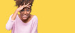 © Krakenimages.com - Beautiful young african american woman wearing glasses over isolated background very happy and smiling looking far away with hand over head. Searching concept.